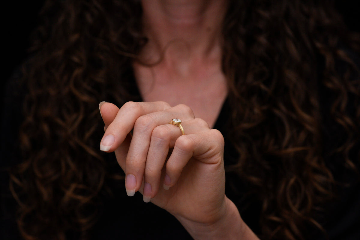 Pebble &amp; Polish Original: Classic Solitaire in 18K with a Rounded Top and Peek-a-Boo Basket