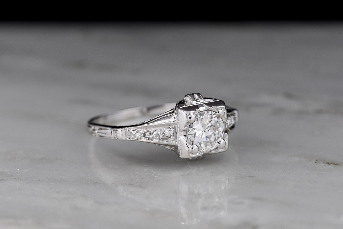 c. Late 1930s Art Deco Engagement Ring with a Transitional Cut Diamond Center