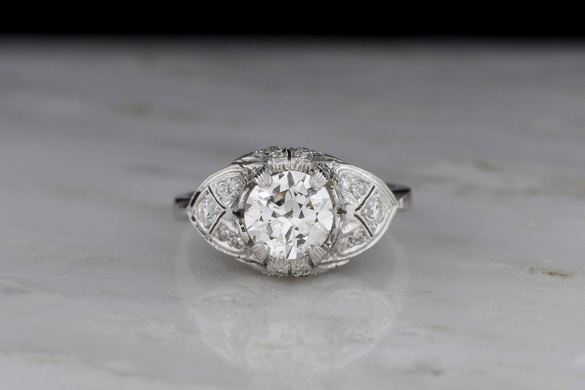 c. Late 1920s Post-Edwardian / Art Deco Engagement Ring with Ornate Spade Shoulders