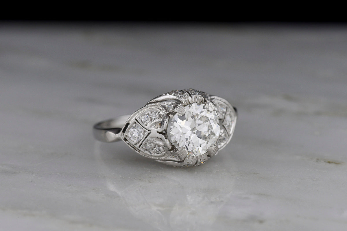 c. Late 1920s Post-Edwardian / Art Deco Engagement Ring with Ornate Spade Shoulders