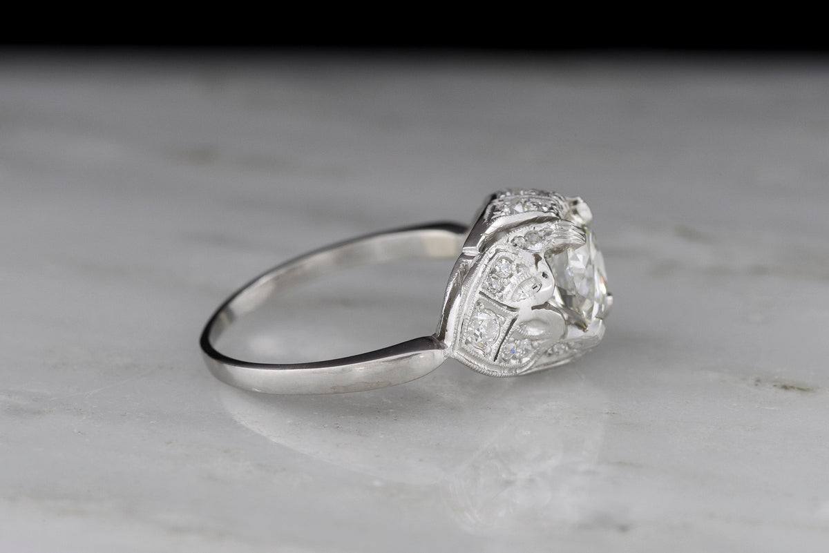 c. Late 1920s Post-Edwardian / Art Deco Engagement Ring with Ornate Spade Shoulders