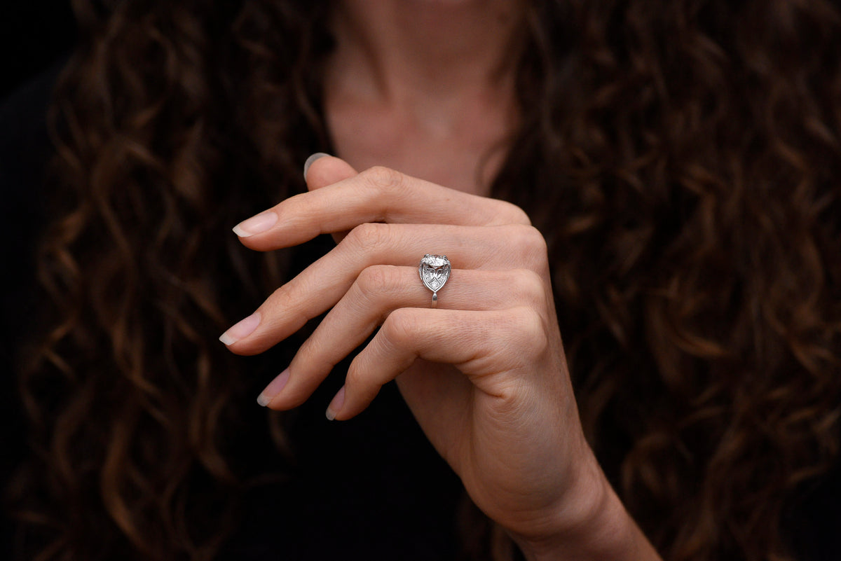 c. Late 1920s Post-Edwardian / Art Deco Engagement Ring with Ornate Spade Shoulders