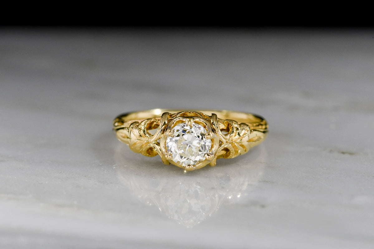 Ornate Yellow Gold and Old European Cut Engagement Ring with Leaf Shoulders and Open Metalwork