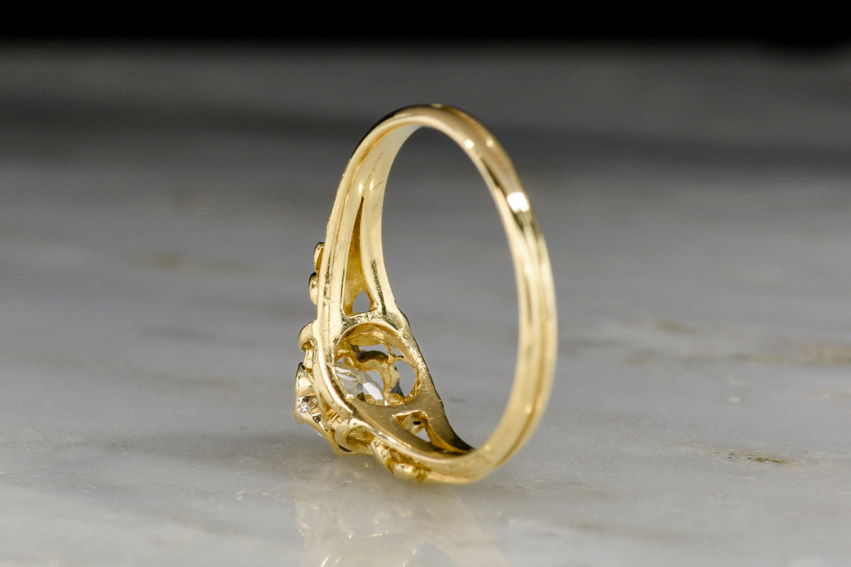 Ornate Yellow Gold and Old European Cut Engagement Ring with Leaf Shoulders and Open Metalwork