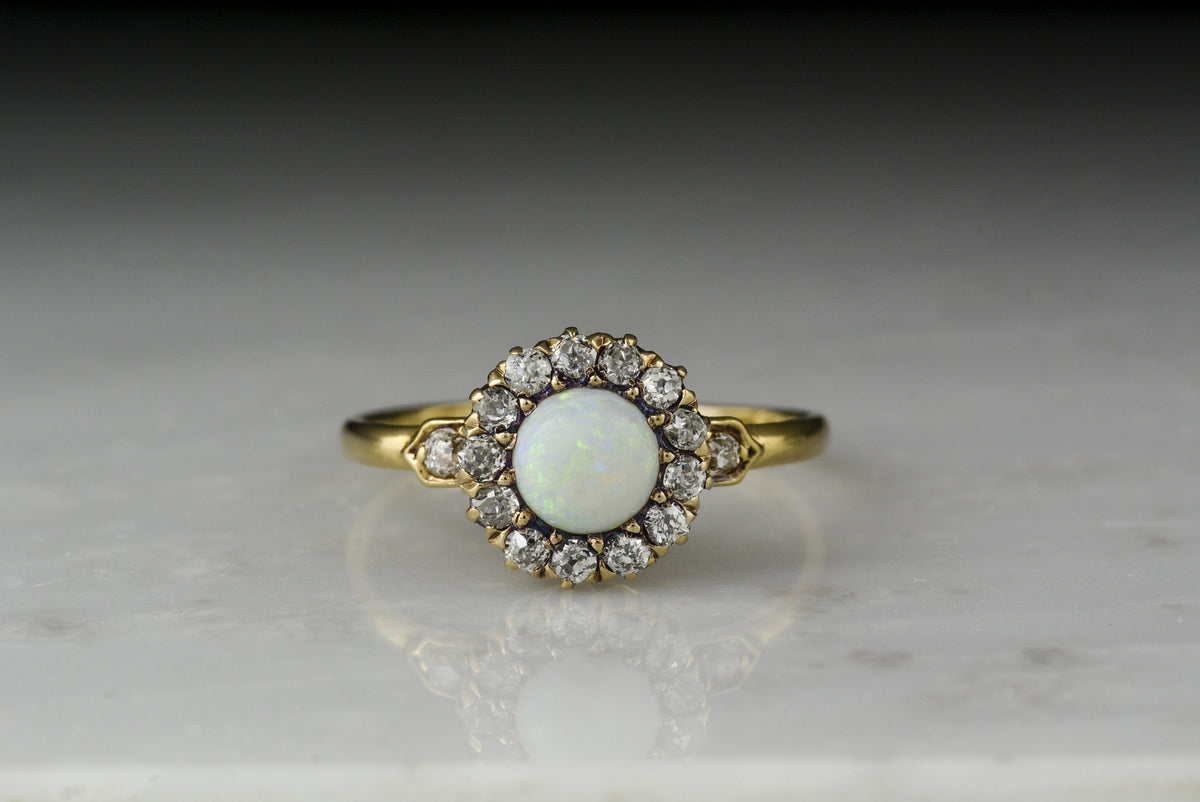 Antique Victorian 18K Rose-Yellow Gold Engagement or Anniversary Ring with an Opal Center and Old Mine Cut Diamond Halo