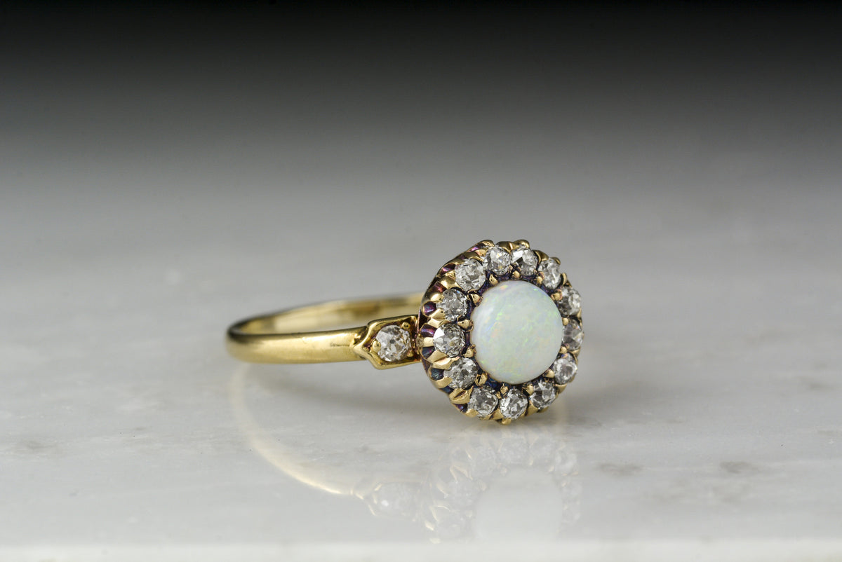 Antique Victorian 18K Rose-Yellow Gold Engagement or Anniversary Ring with an Opal Center and Old Mine Cut Diamond Halo