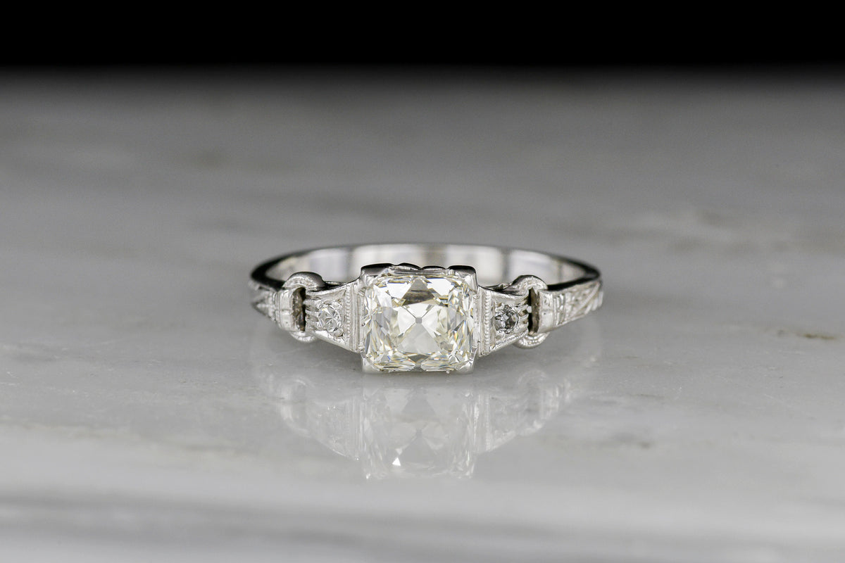 Late Edwardian / Early Art Deco Engagement Ring with a Peruzzi Cut Diamond Center