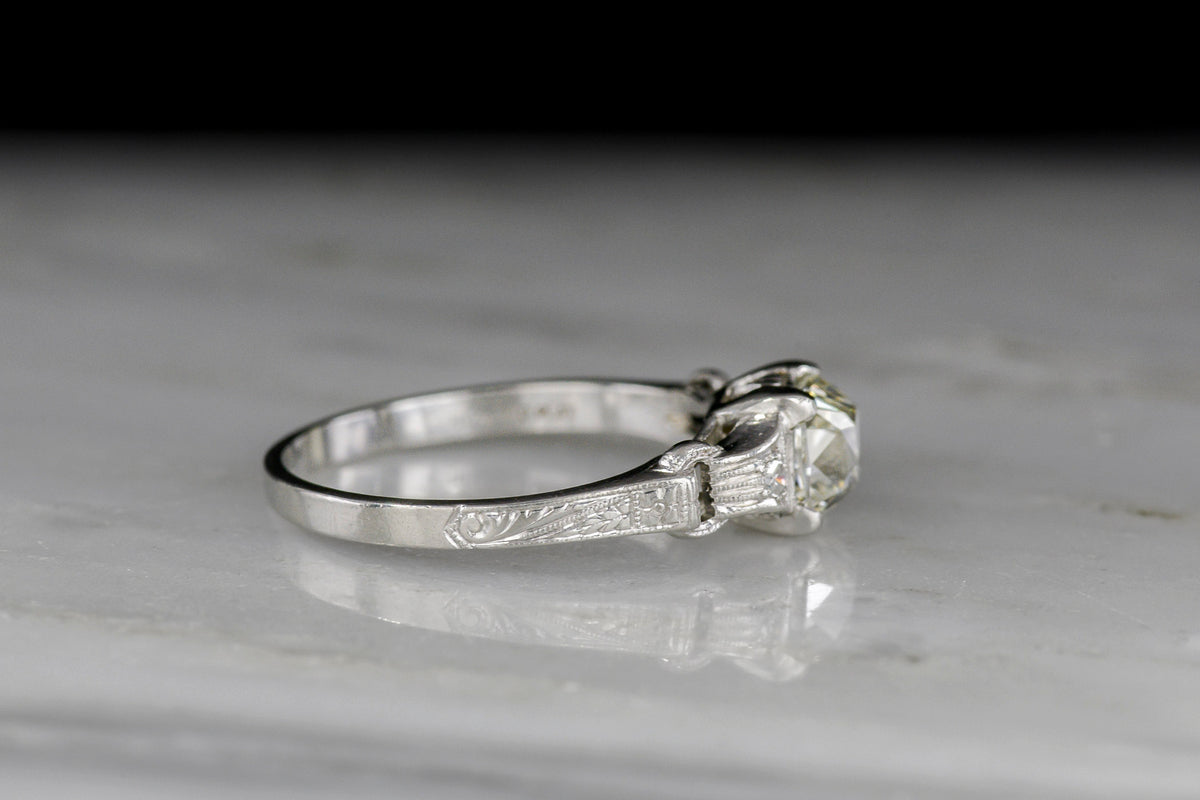 Late Edwardian / Early Art Deco Engagement Ring with a Peruzzi Cut Diamond Center