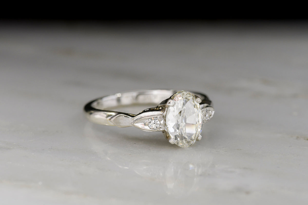 Late Art Deco / Early Midcentury Engagement Ring with a 1.00 Carat Oval Cut Diamond Center