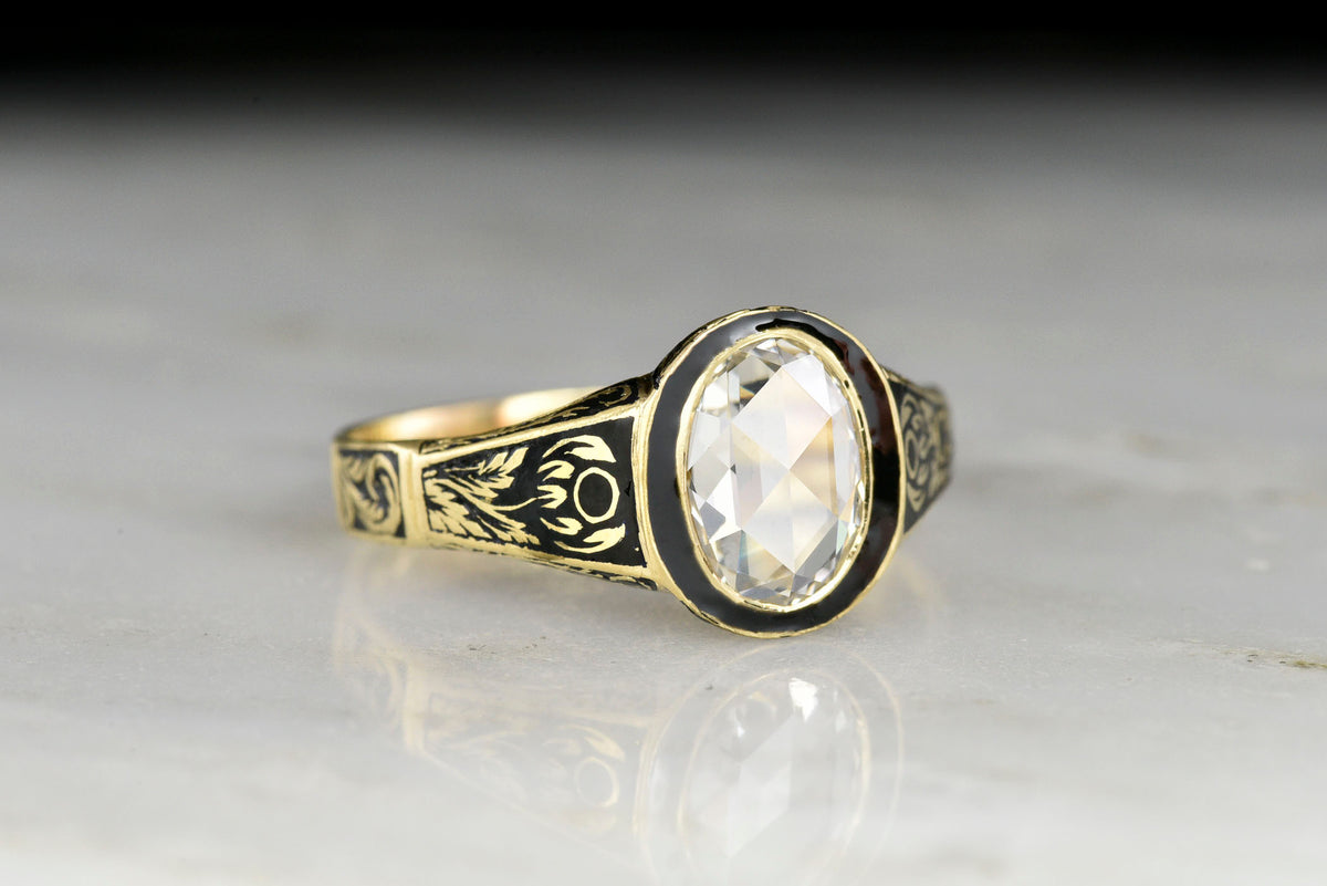 Victorian Mourning Ring (London, 1844) in Gold and Black Enamel with an Oval Rose Cut Diamond