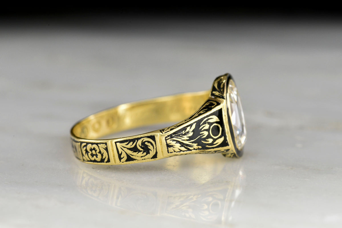 Victorian Mourning Ring (London, 1844) in Gold and Black Enamel with an Oval Rose Cut Diamond