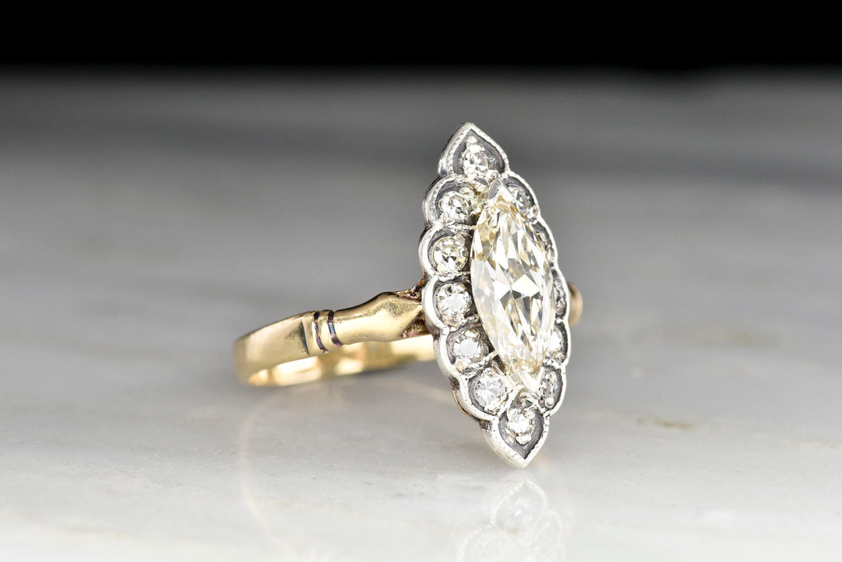 Victorian Gold and Silver Navette Ring with a Marquise Cut Diamond Center