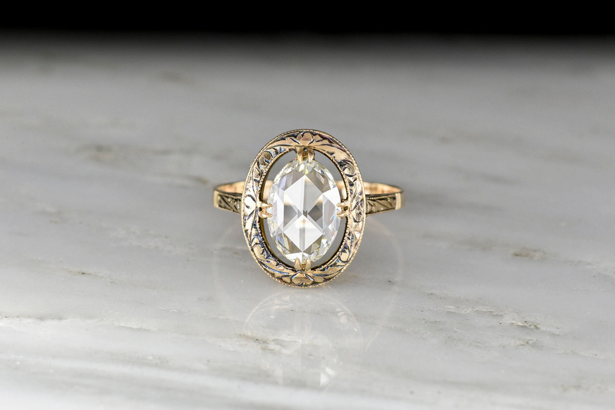 Late Victorian Oval Rose Cut Diamond Ring with an Engraved Halo