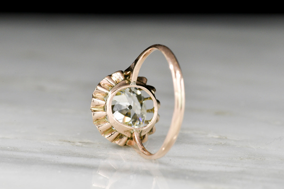 Victorian Rose Gold Buttercup Solitaire with a Spready Antique Cushion Cut Diamond Crown
