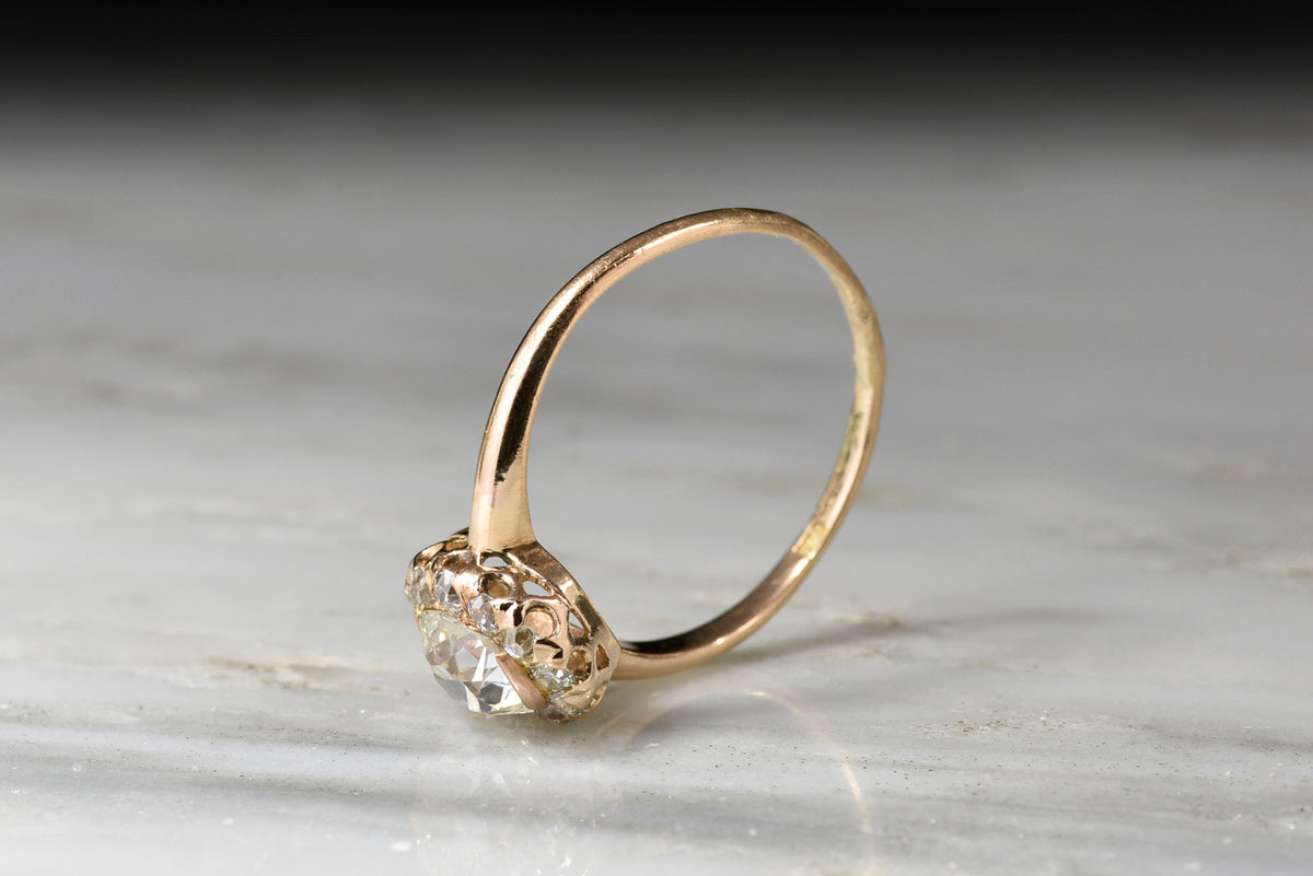 Victorian Old Mine Cut Diamond Halo Engagement Ring in Rose Gold
