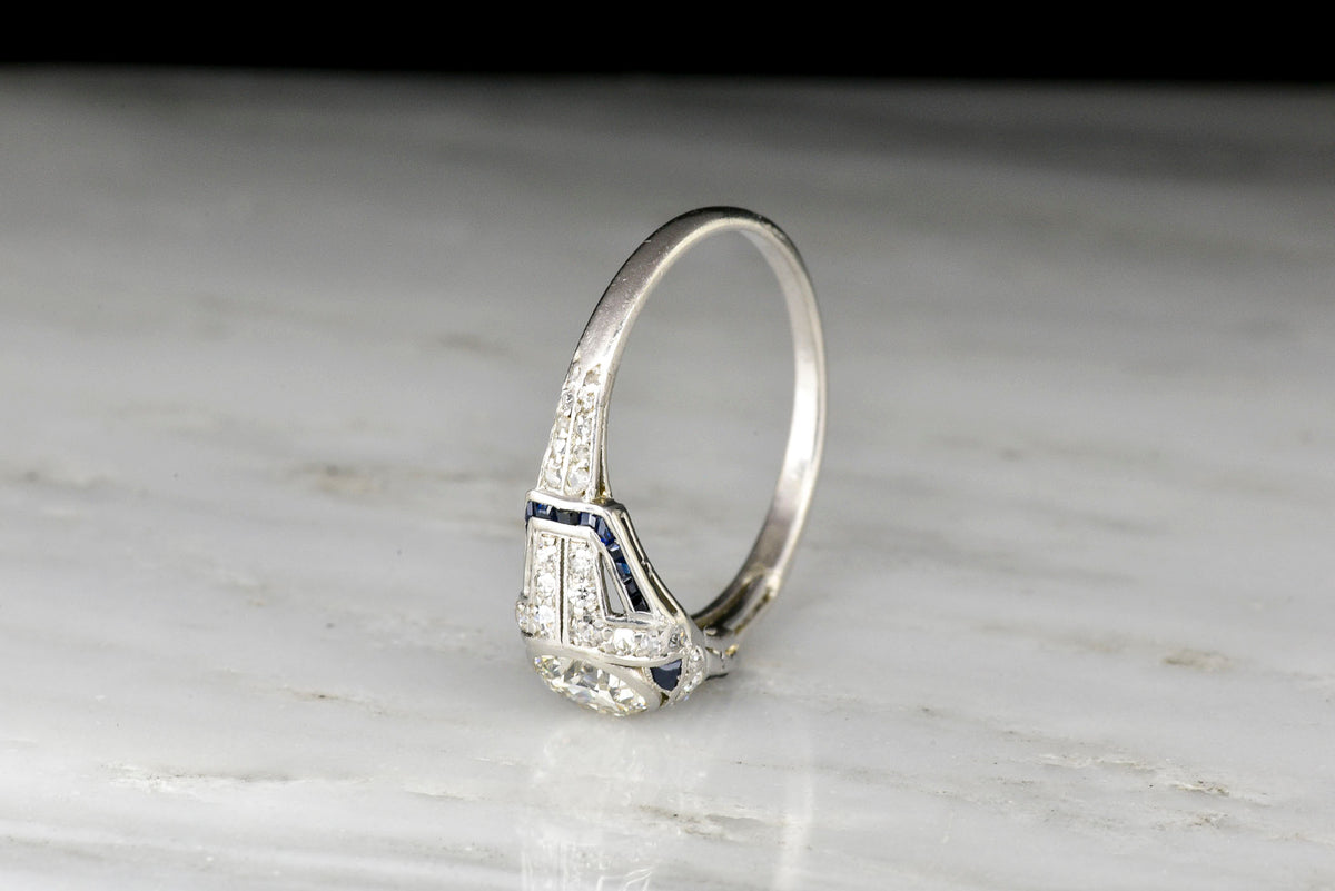 Art Deco Diamond and Sapphire Ring with a Transitional Cut Diamond Center