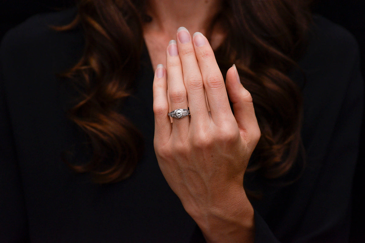 Art Deco Diamond and Sapphire Ring with a Transitional Cut Diamond Center