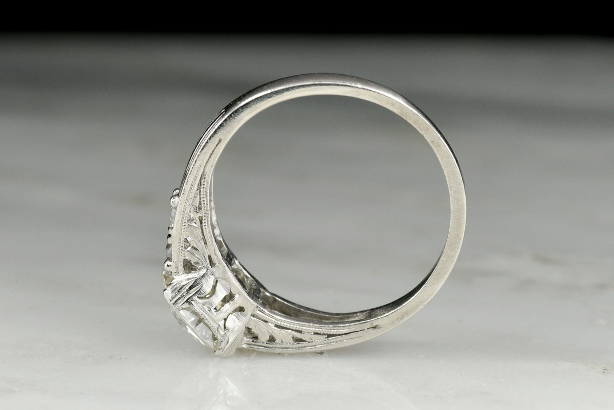 c. 1920s Engraved Platinum Engagement Ring with a 1.44 Carat Old European Cut Diamond Center