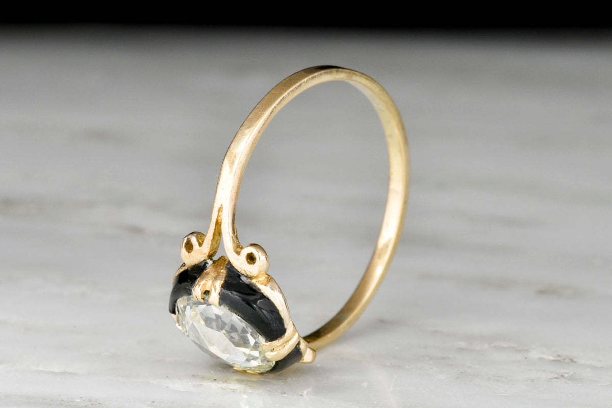 Victorian Gold and Black Enamel Split-Shank Ring with a 1.30 Carat Rose Cut Diamond