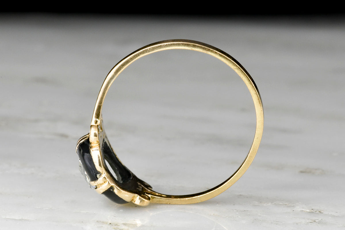 Victorian Gold and Black Enamel Split-Shank Ring with a 1.30 Carat Rose Cut Diamond