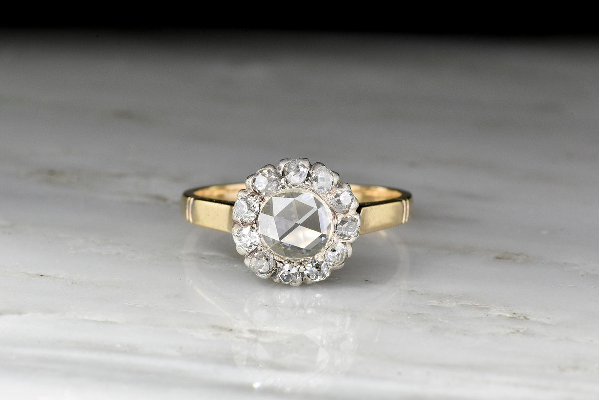 Victorian Gold and Silver Diamond Cluster Ring with a Rose Cut Diamond Center