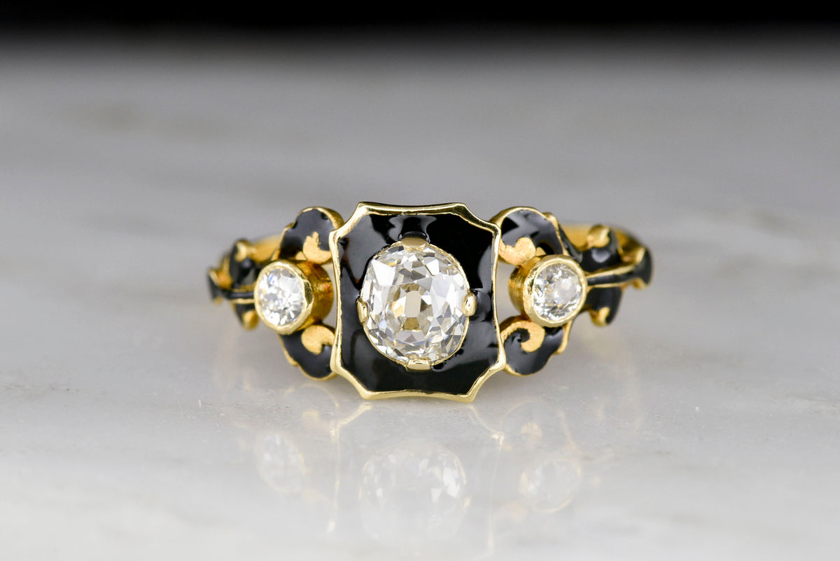 Early Victorian (London, 1844) 18K Gold and Black Enamel Ring with an Old Mine Cut Diamond Center