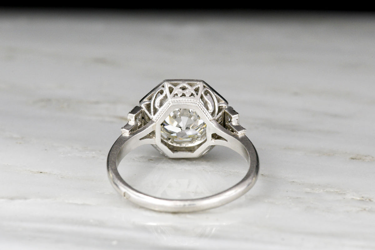 French Art Deco Old European Cut Diamond Engagement Ring with an Octagonal Halo