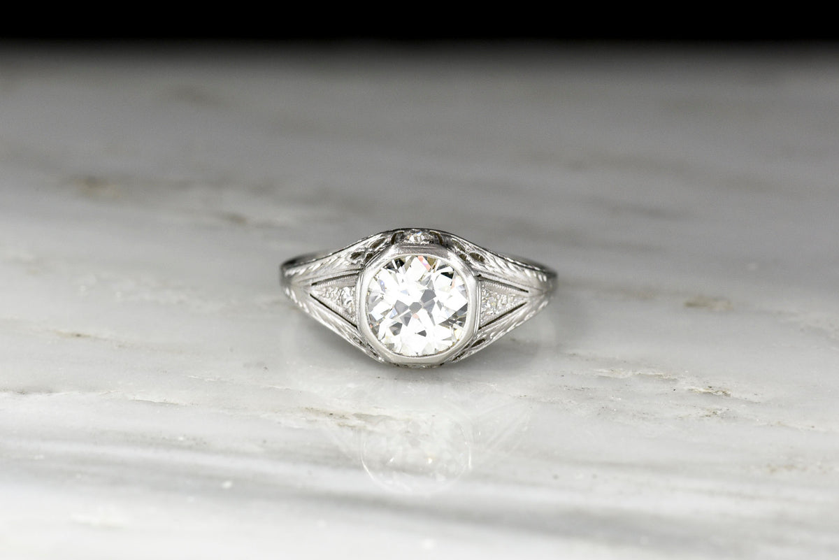 Ornate Late Edwardian Engagement Ring with Ornate Platinum Work and Hand Engraving