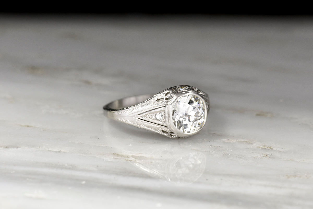 Ornate Late Edwardian Engagement Ring with Ornate Platinum Work and Hand Engraving
