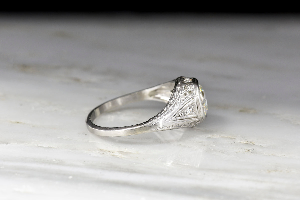 Ornate Late Edwardian Engagement Ring with Ornate Platinum Work and Hand Engraving