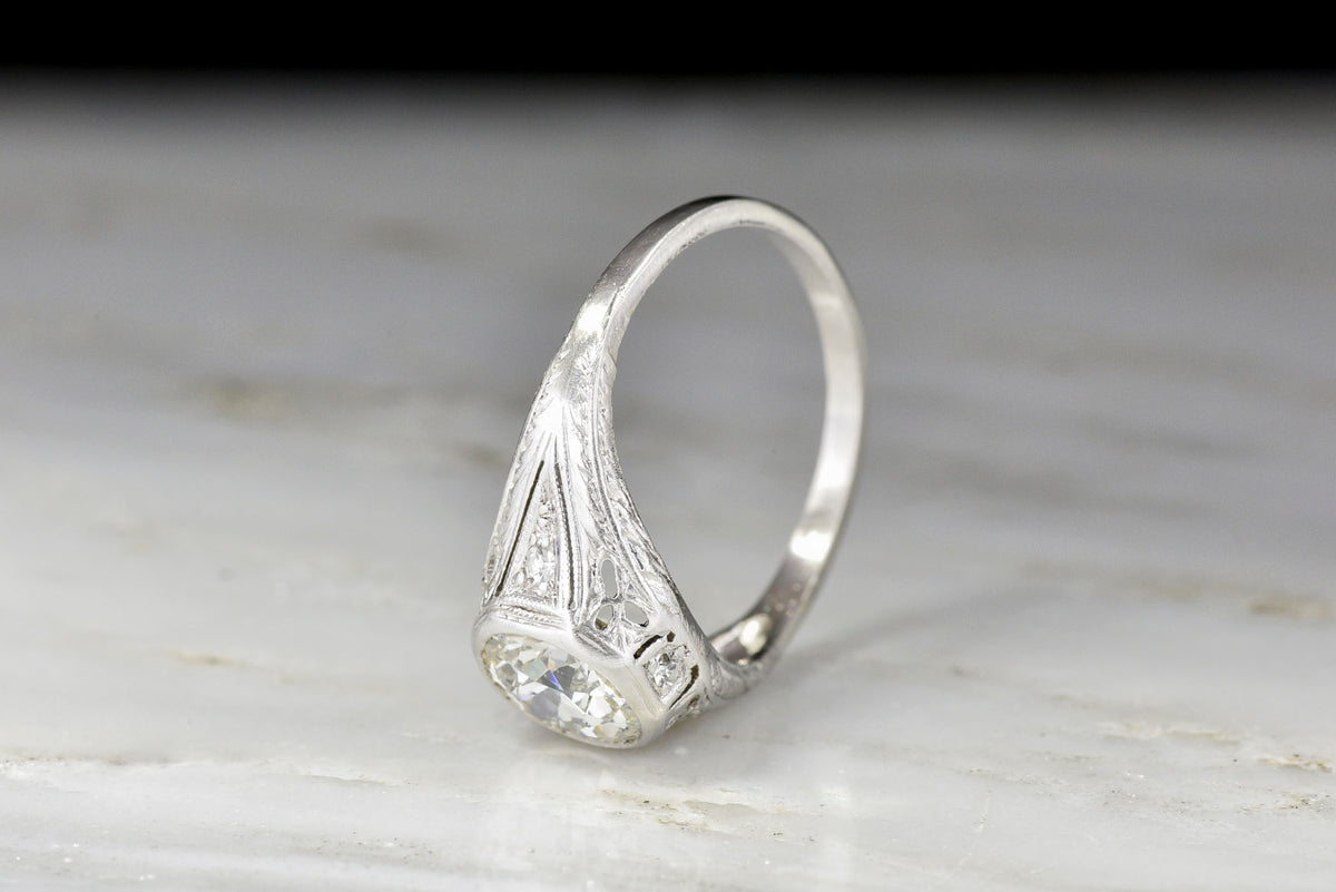 Ornate Late Edwardian Engagement Ring with Ornate Platinum Work and Hand Engraving