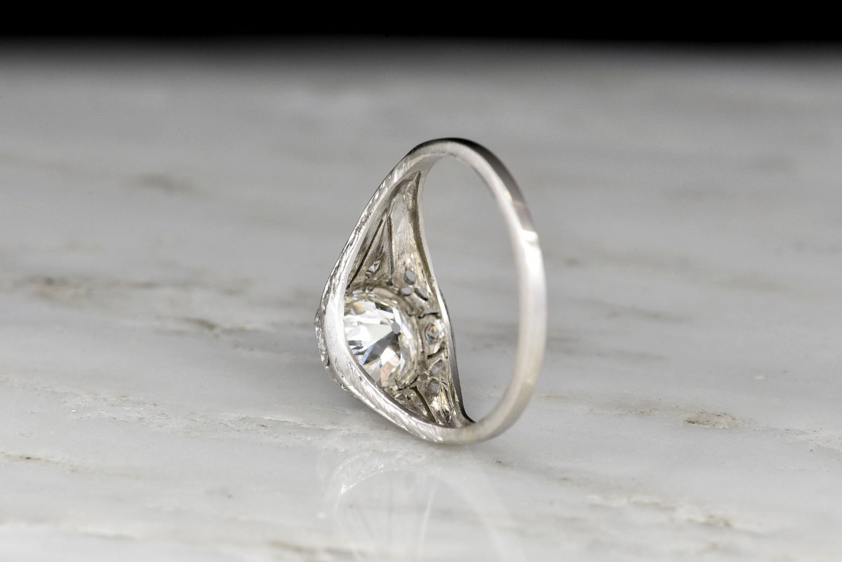 Ornate Late Edwardian Engagement Ring with Ornate Platinum Work and Hand Engraving