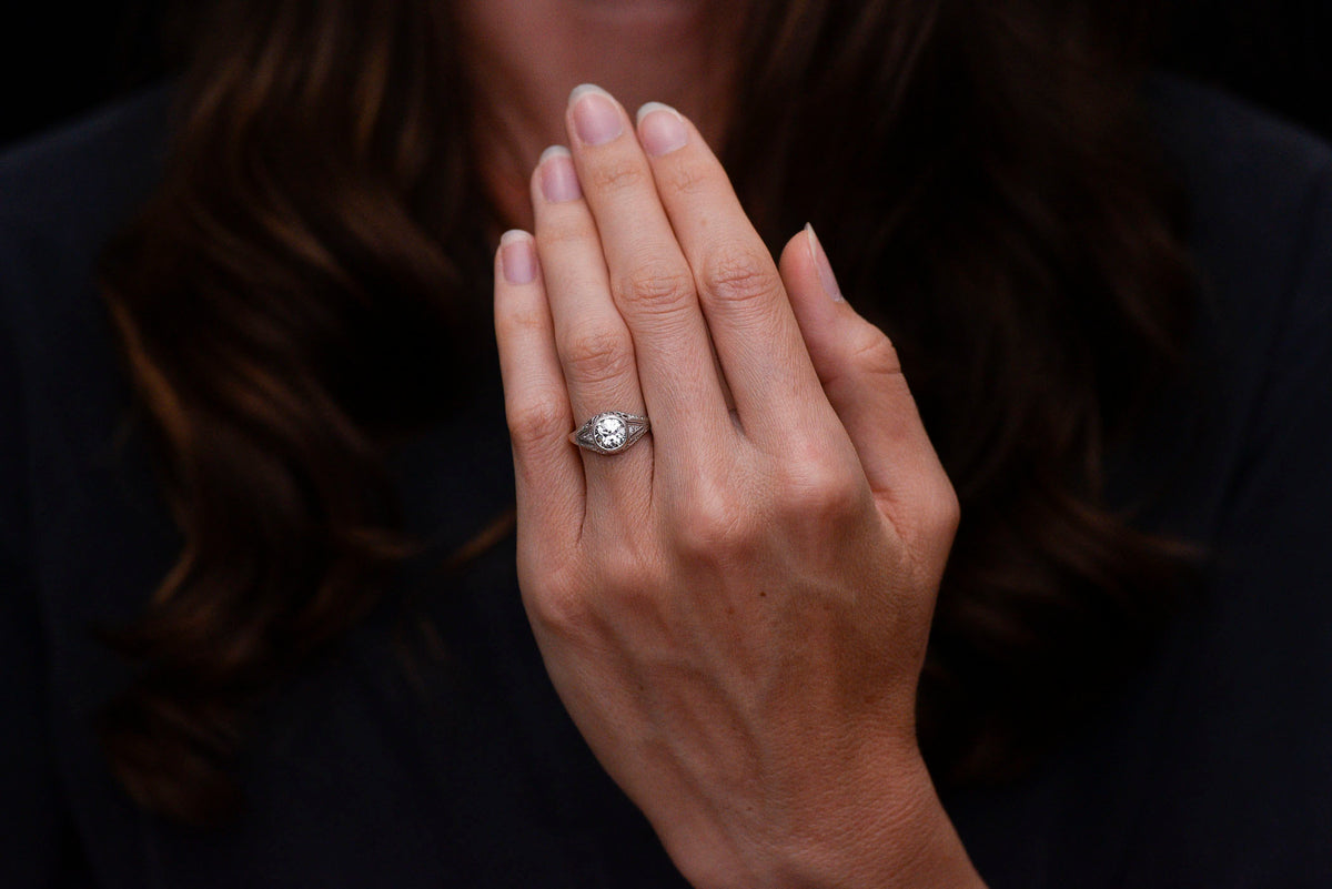 Ornate Late Edwardian Engagement Ring with Ornate Platinum Work and Hand Engraving