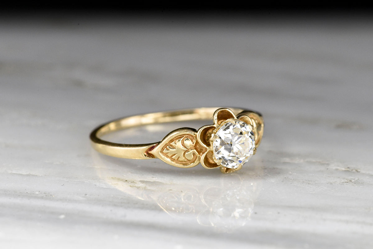 Post-Victorian Solitaire Buttercup Engagement Ring with an Old European Cut Diamond Center