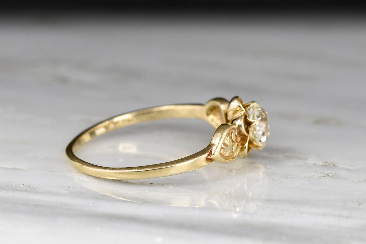 Post-Victorian Solitaire Buttercup Engagement Ring with an Old European Cut Diamond Center