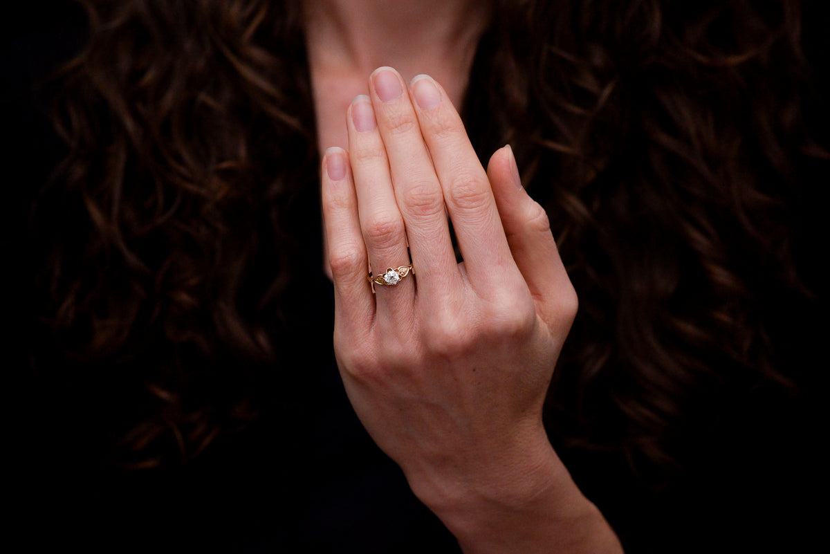 Post-Victorian Solitaire Buttercup Engagement Ring with an Old European Cut Diamond Center