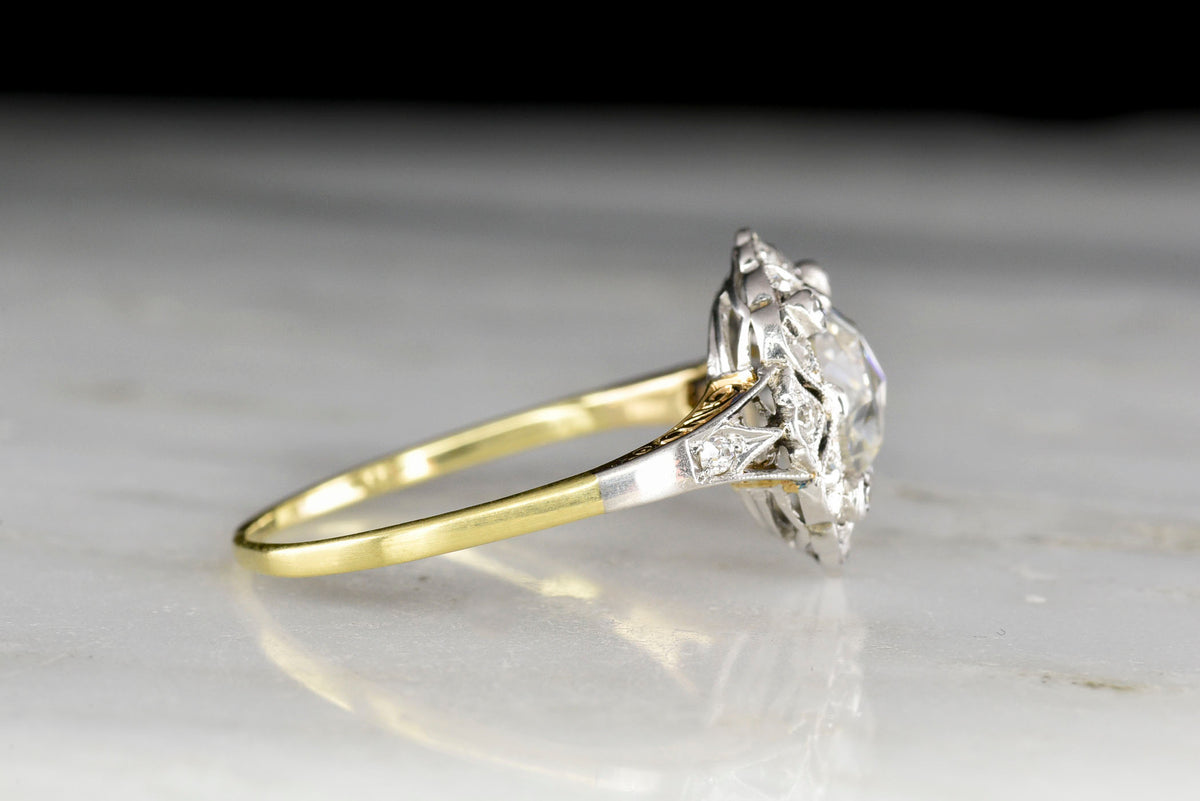 Ornate Edwardian / Belle Époque Gold and Platinum Ring with a Rose Cut Diamond Center
