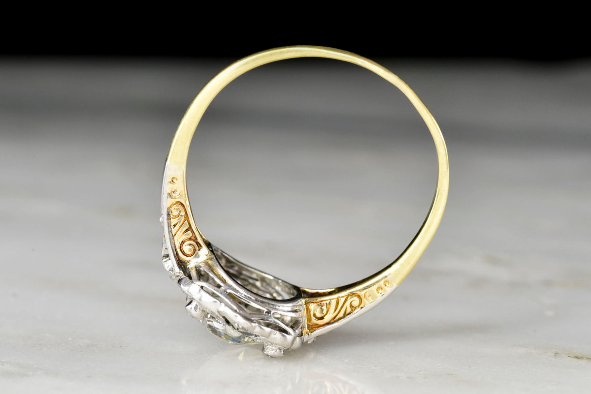 Ornate Edwardian / Belle Époque Gold and Platinum Ring with a Rose Cut Diamond Center