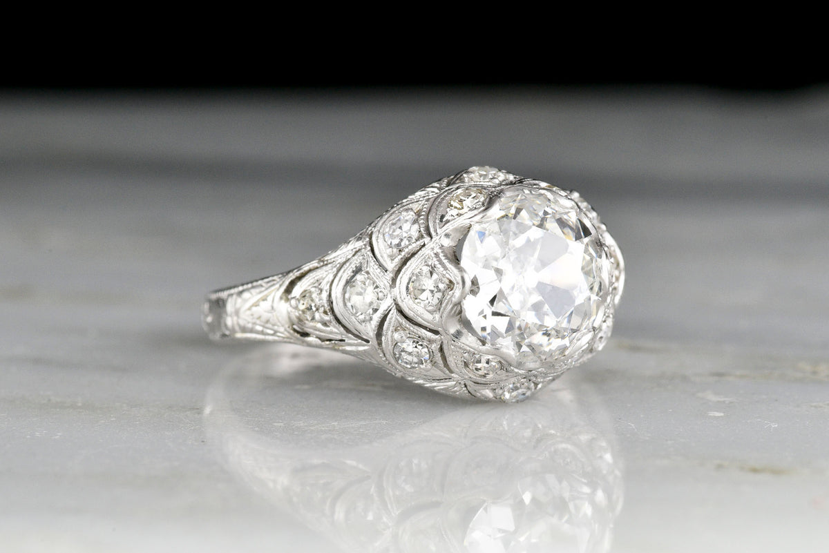 Ornate Hand-Pierced Edwardian Platinum Ring with an Art-Nouveau-Inspired Scallop Motif
