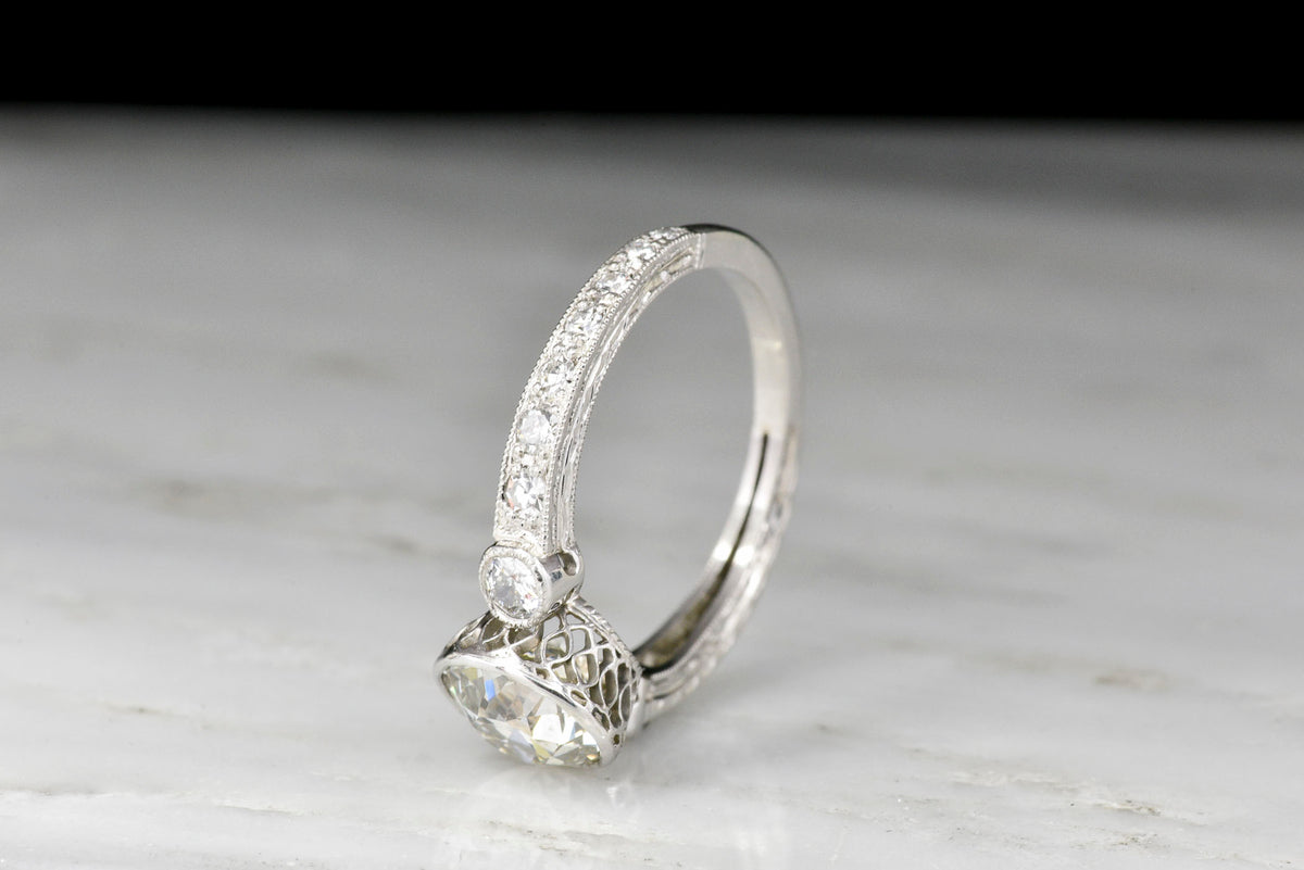 Ornate Edwardian Platinum Engagement Ring with a GIA 1.59 Carat Old European Cut Diamond Center