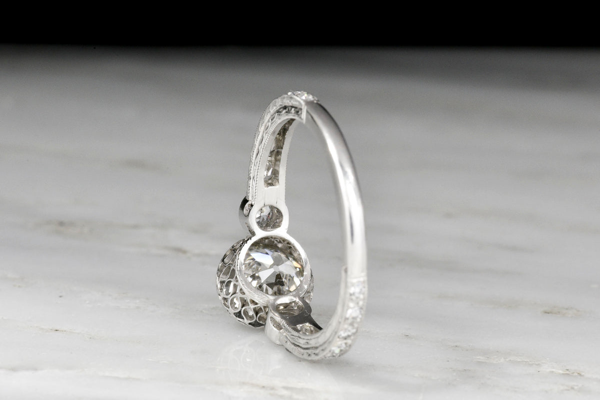 Ornate Edwardian Platinum Engagement Ring with a GIA 1.59 Carat Old European Cut Diamond Center