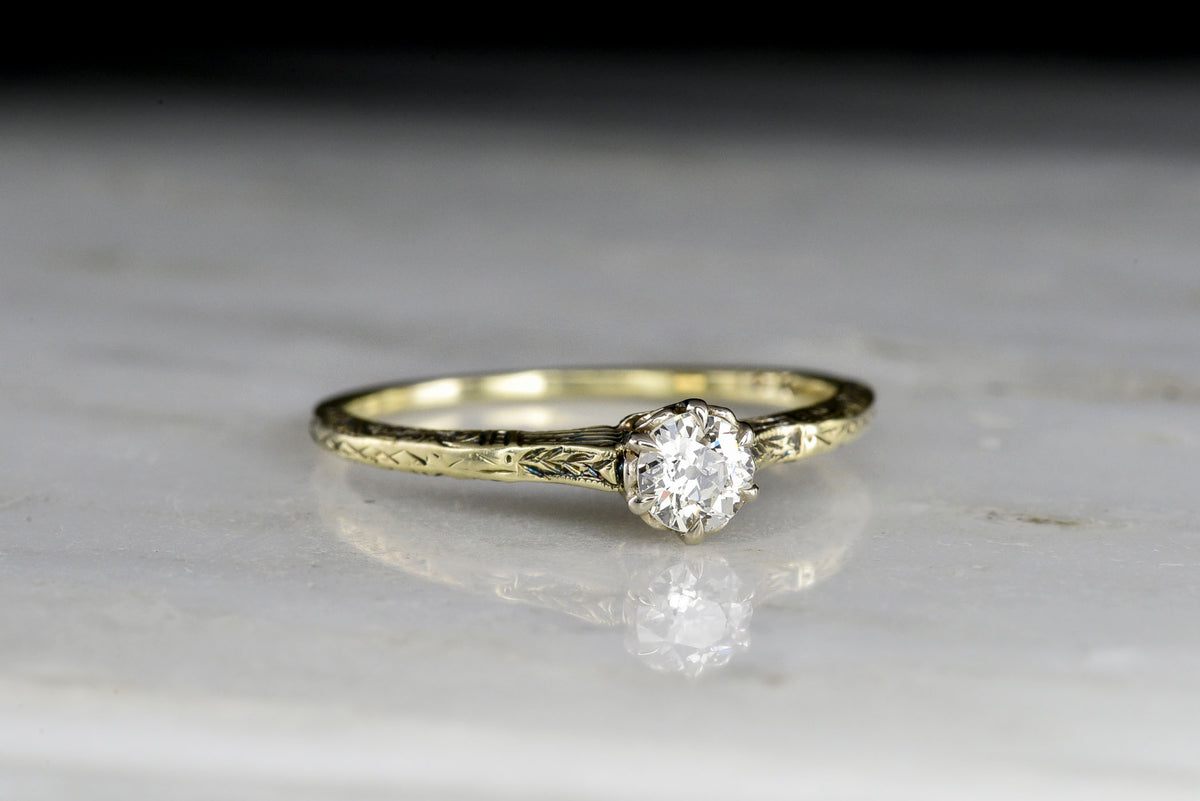 Early 1900s Green Gold Solitaire with Deep Engraving and an Old European Cut Diamond Center