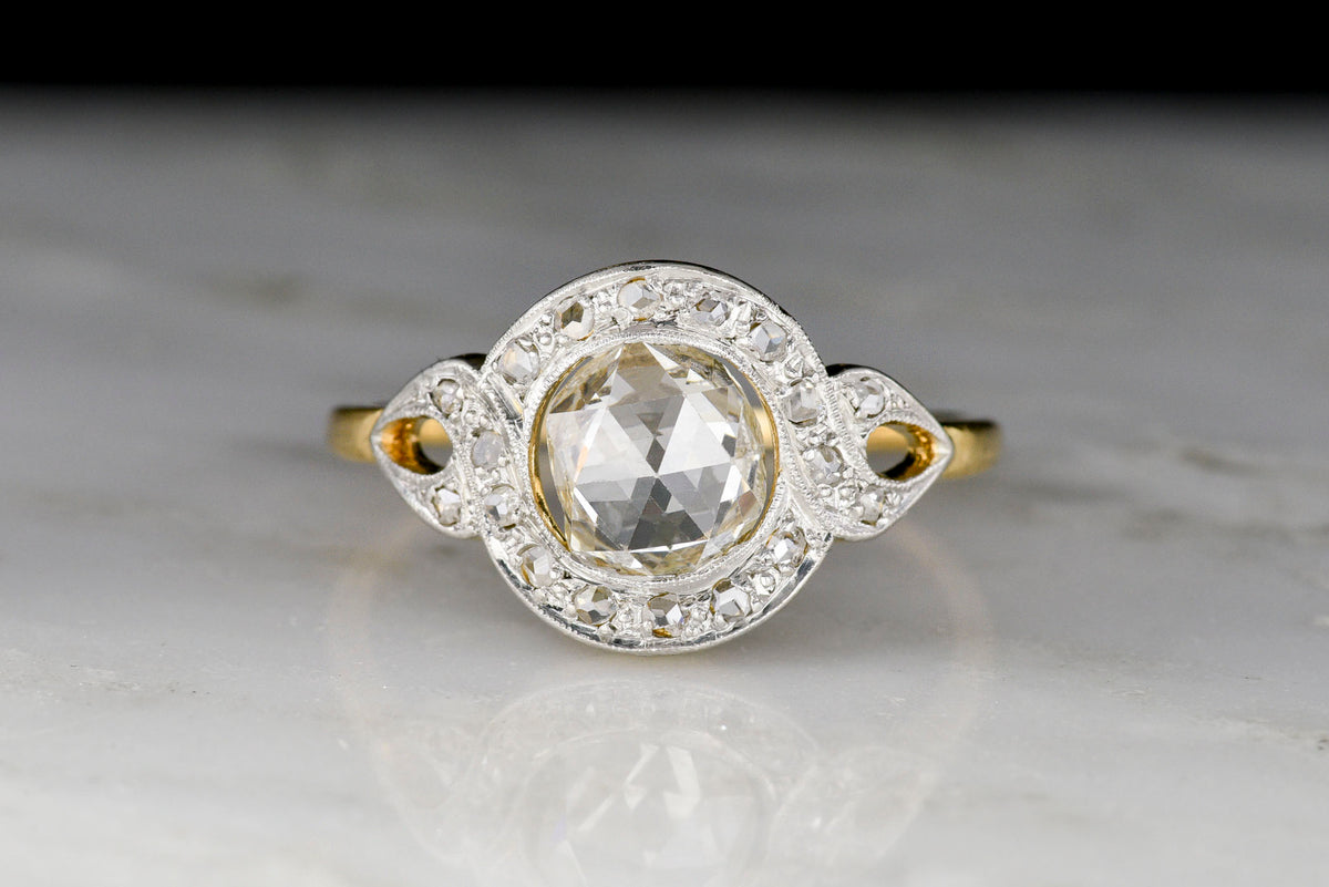 Belle Époque Two-Toned Ring with a Tall-Domed Antique Rose Cut Diamond Center