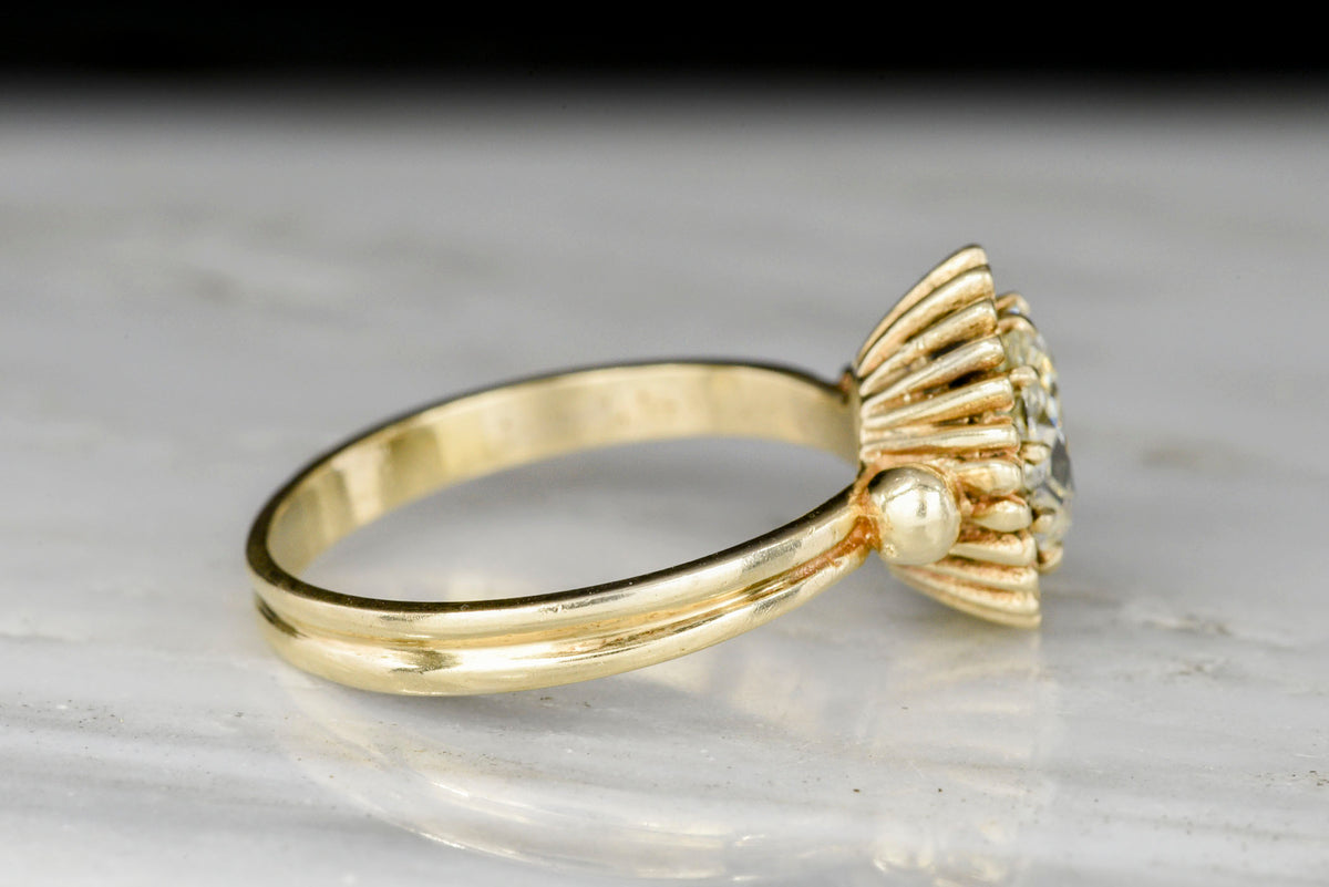 Unique Art Deco or Mid Century Gold Sunburst Ring with an Old Mine Cut Diamond Center
