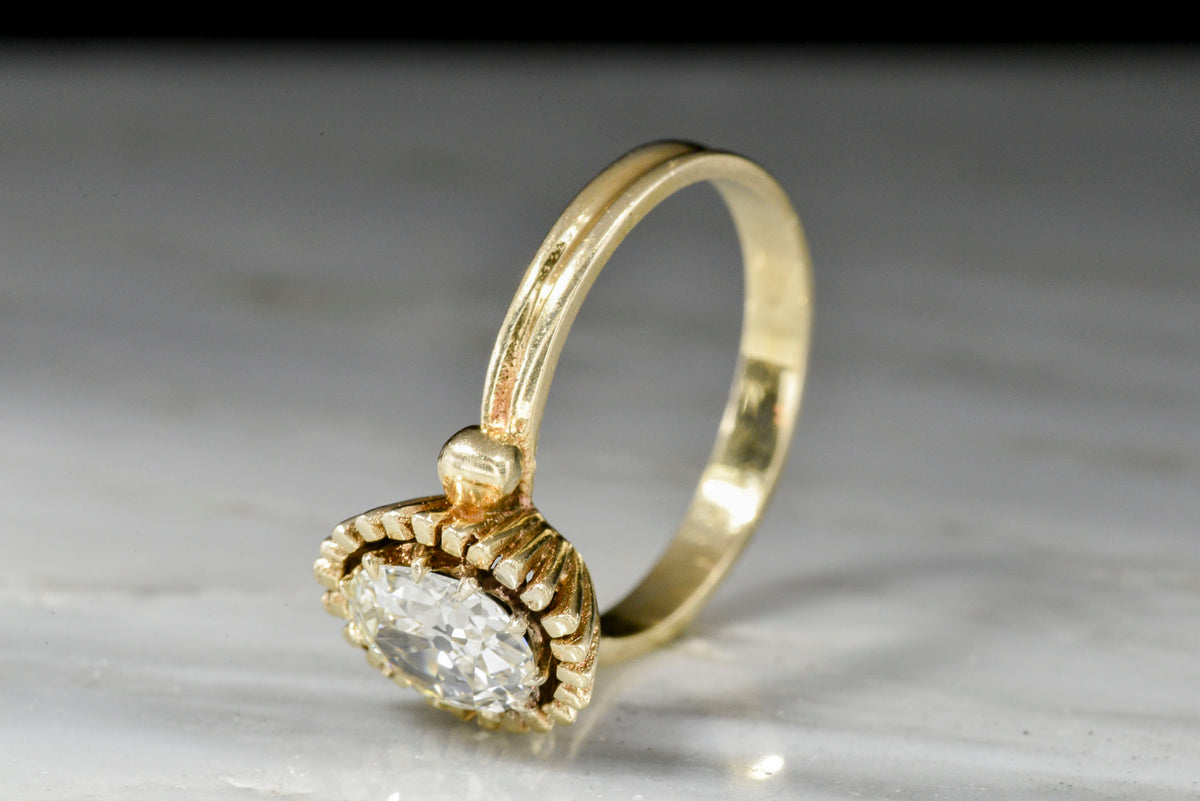 Unique Art Deco or Mid Century Gold Sunburst Ring with an Old Mine Cut Diamond Center