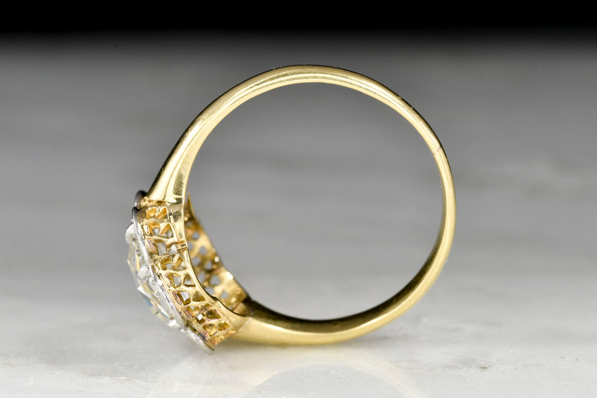 Belle Époque Gold and Platinum Ring with a Floating Floral Halo and Rose Cut Diamond Center