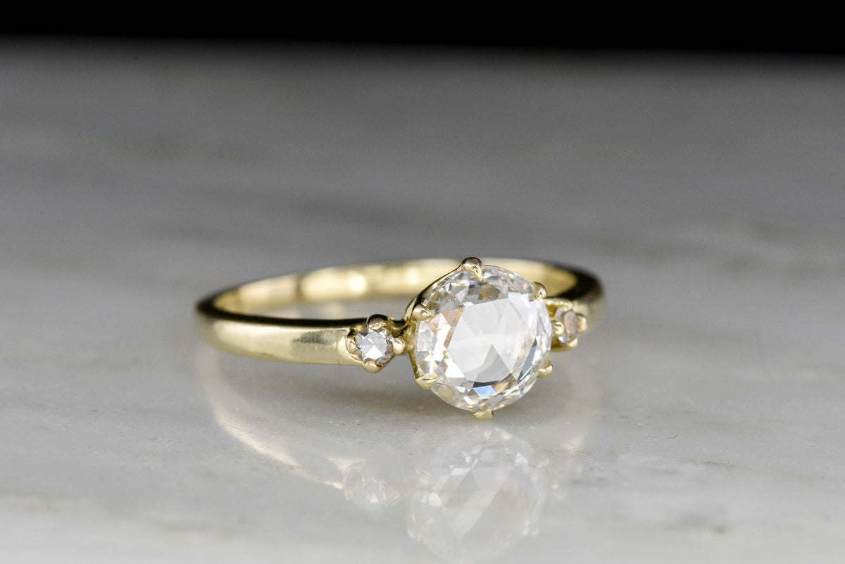 Vintage Three-Stone Engagement Ring with a Round Rose Cut Diamond Center
