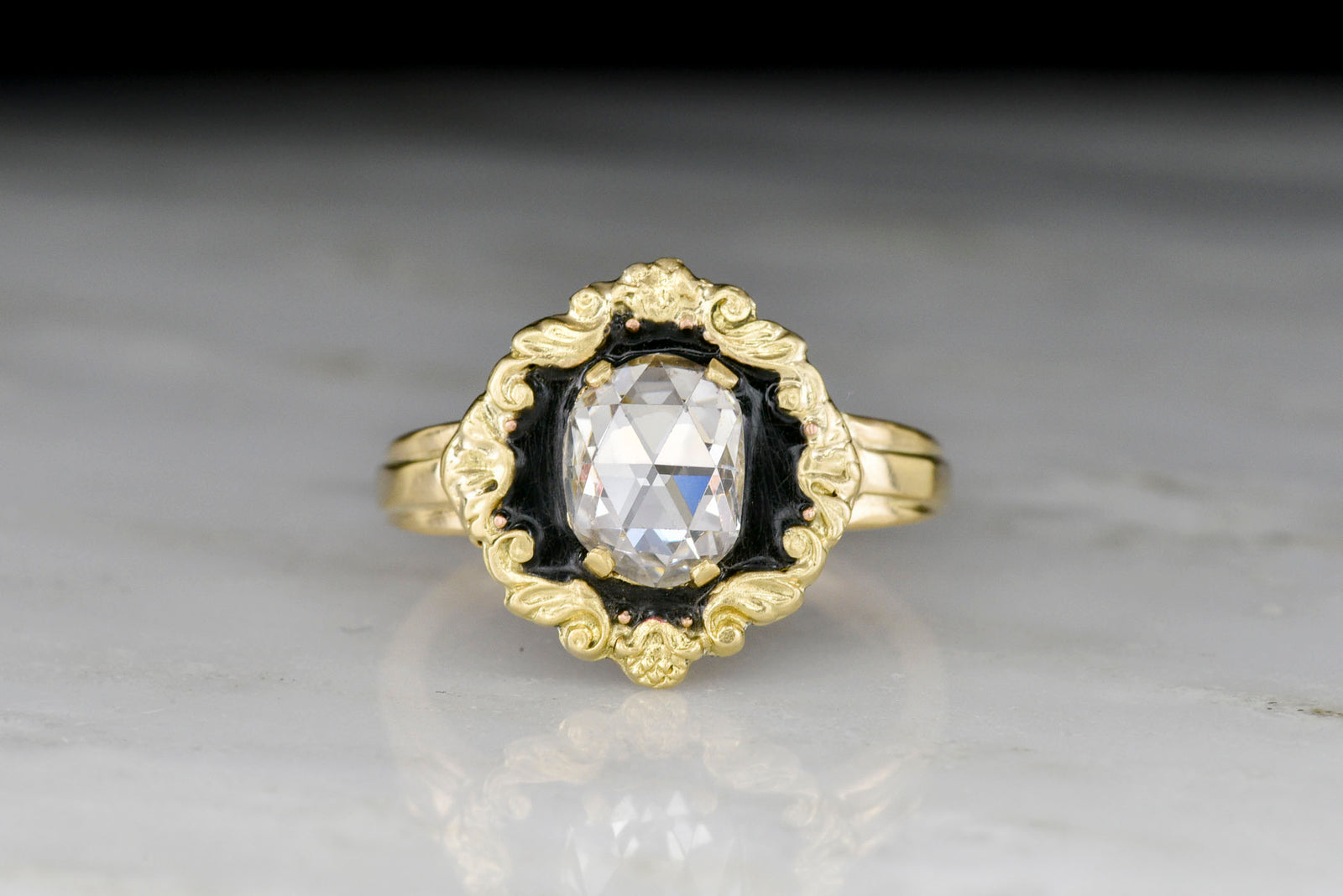 Victorian / Rococo Gold Ring with Black Enamel and an Antique Oval Rose Cut Diamond
