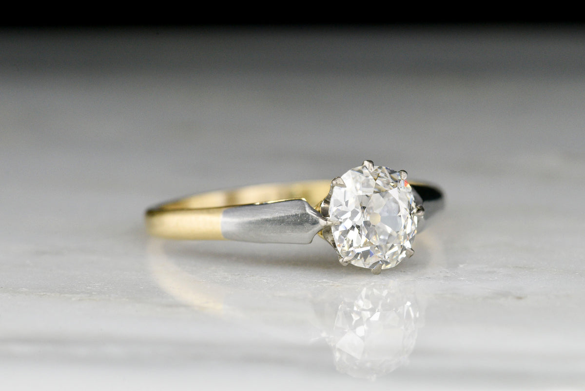 Vintage Two-Tone Cathedral Mount Engagement Ring with an Old Mine Cut Diamond Center