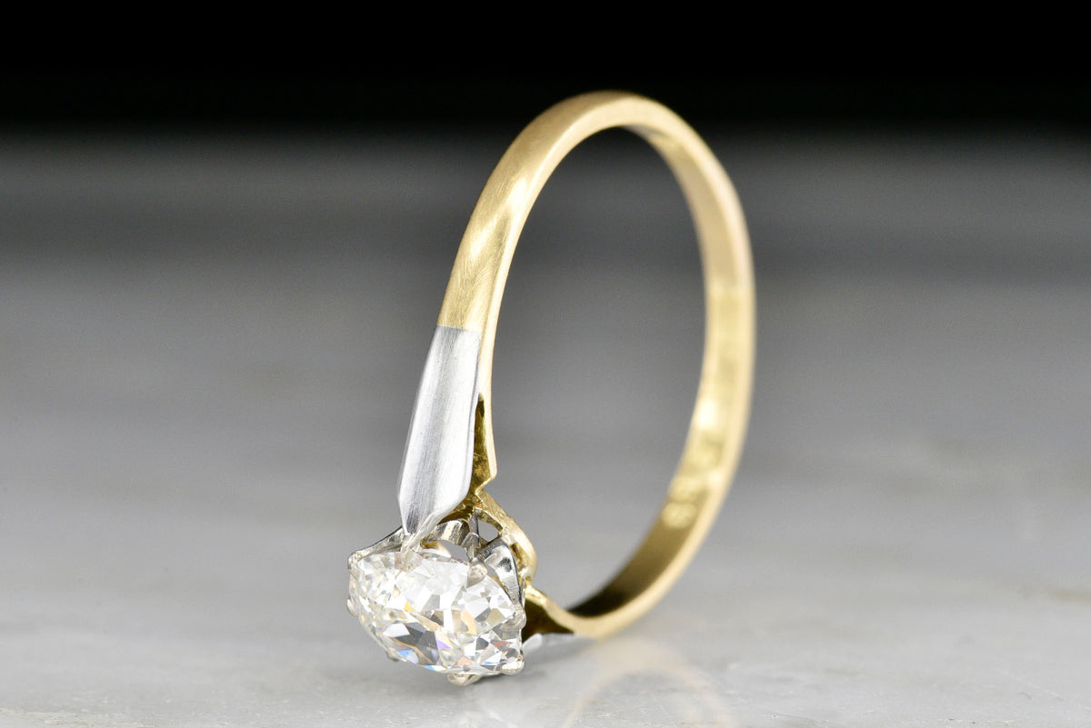 Vintage Two-Tone Cathedral Mount Engagement Ring with an Old Mine Cut Diamond Center